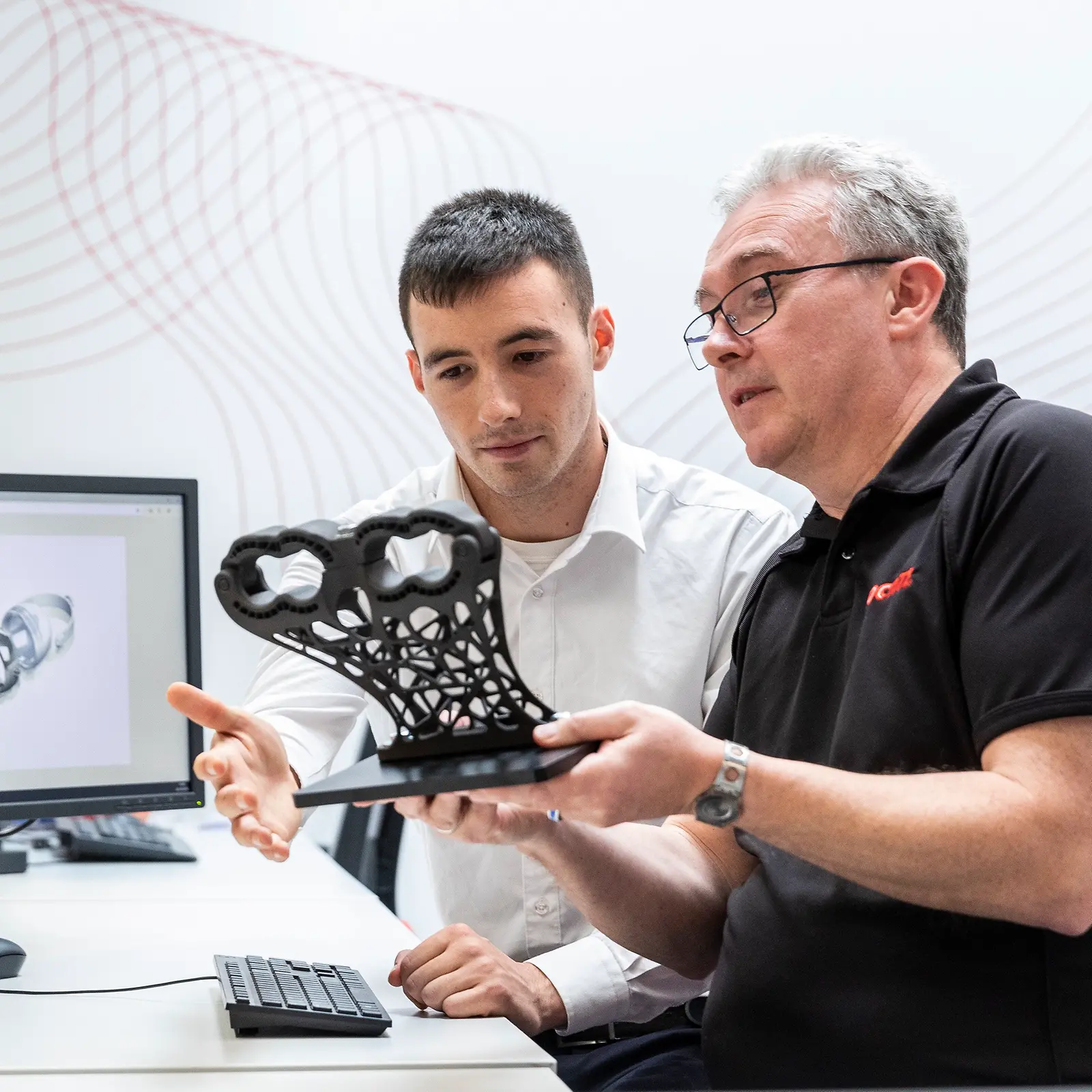 汉高工程师正在与汽车和工业领域的客户合作优化3D打印部件。
